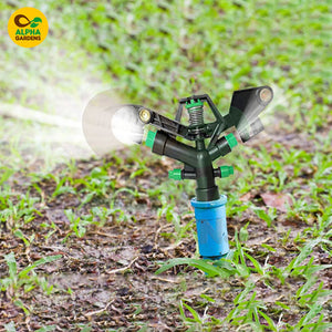 Garden sprinkler on grass 