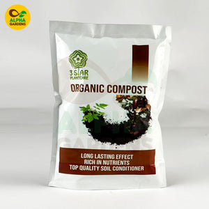 Bag of organic compost with Alpha Gardens logo on a white background