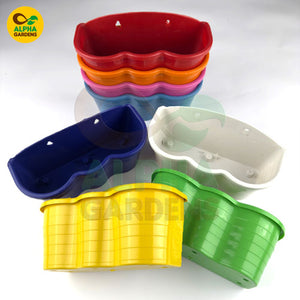 Set of colorful plastic wall planters 