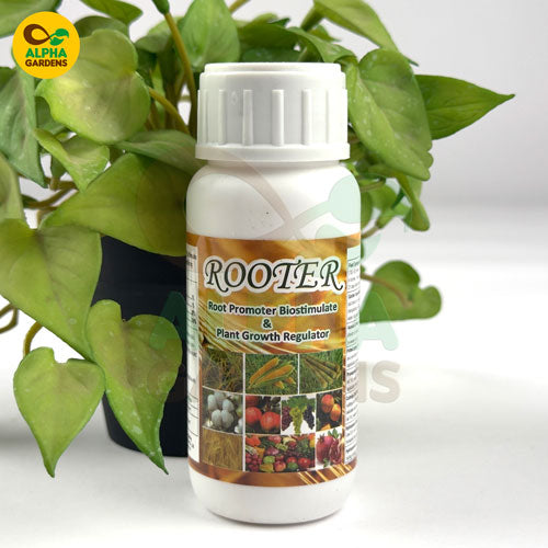 bottle-of-rooter-plant-growth-regulator-with-a-plant-in-the-background