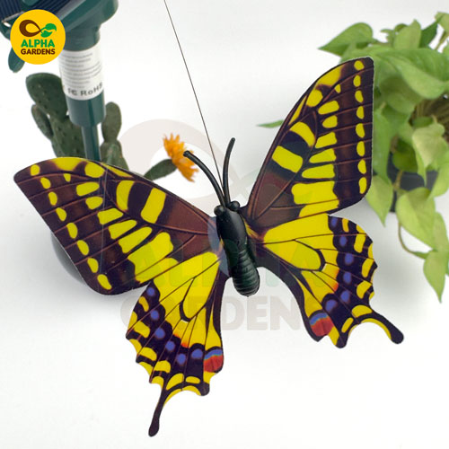 colorful-butterfly-decoration-with-green-plants-in-the-background