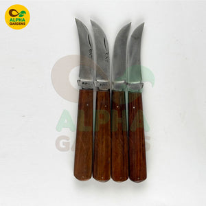 Four gardening knives with wooden handles 