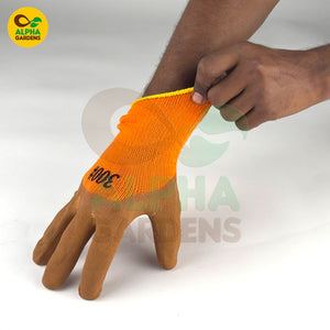 orange gardening glove on a white 